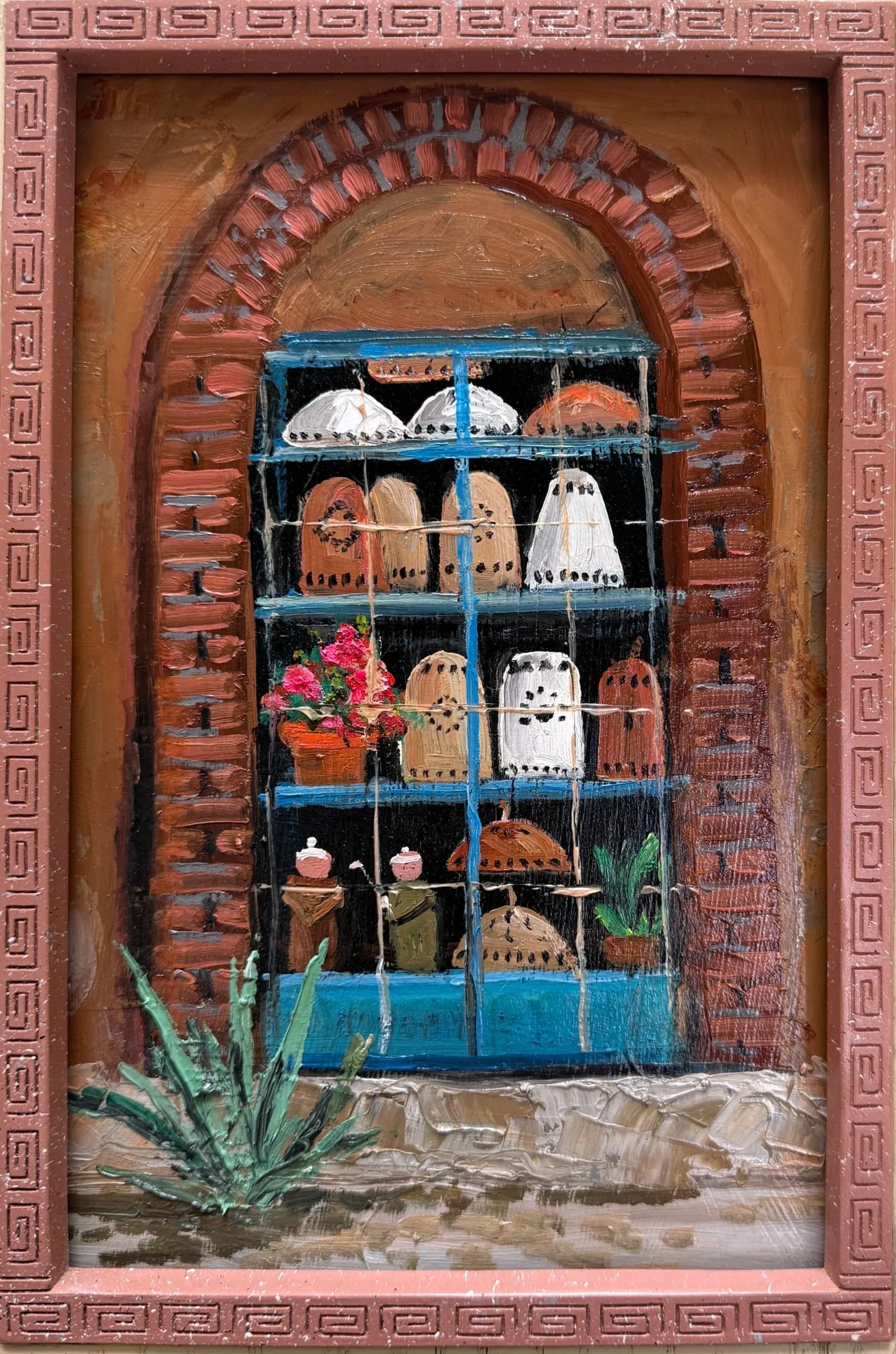 A decorative miniature window with a faux brick frame, showing shelves with painted miniature ceramic pots and vases, a potted plant, and some other small decorative items.
