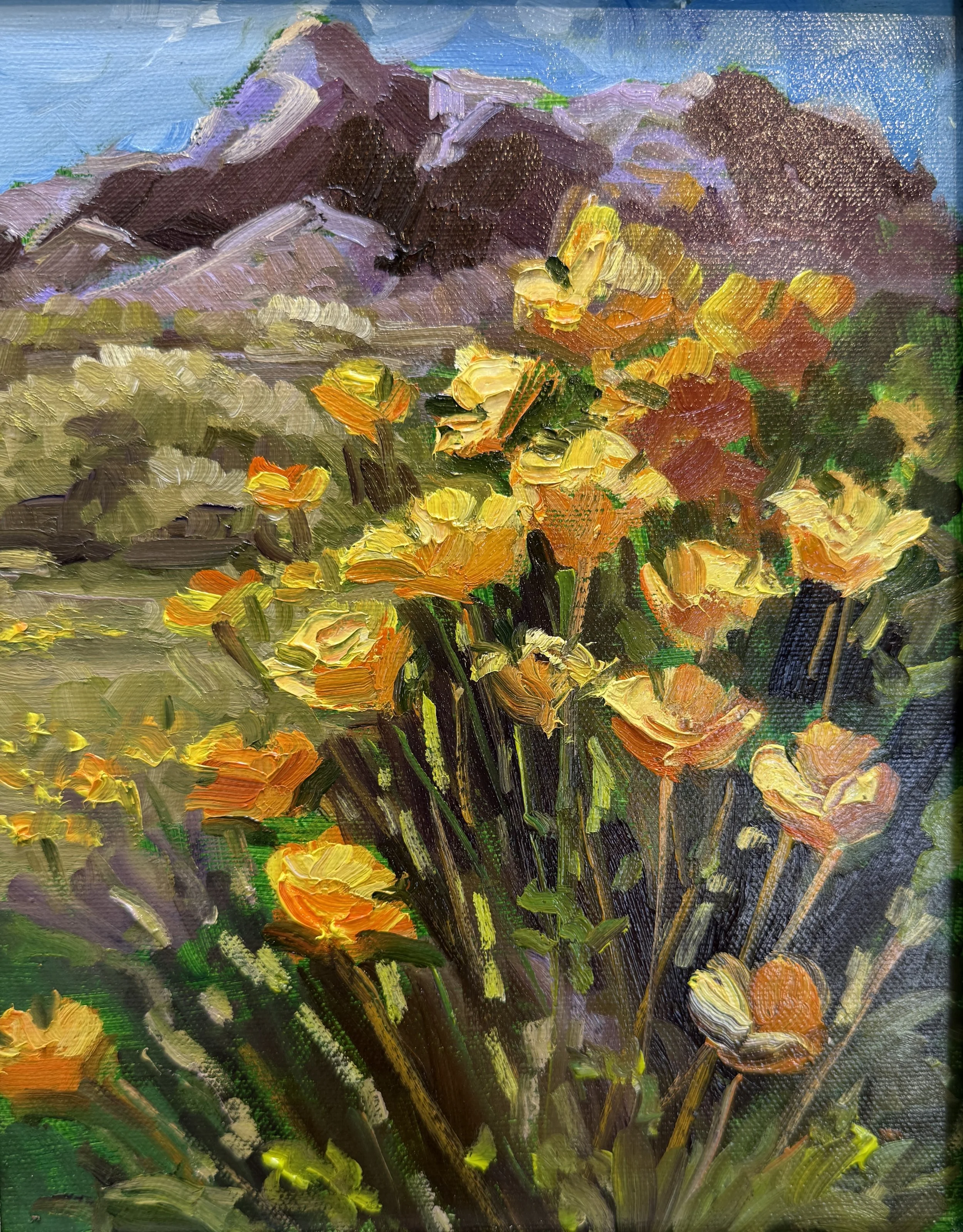 An impressionistic landscape painting of mountains, flowers, and greenery with a light blue sky in the background.