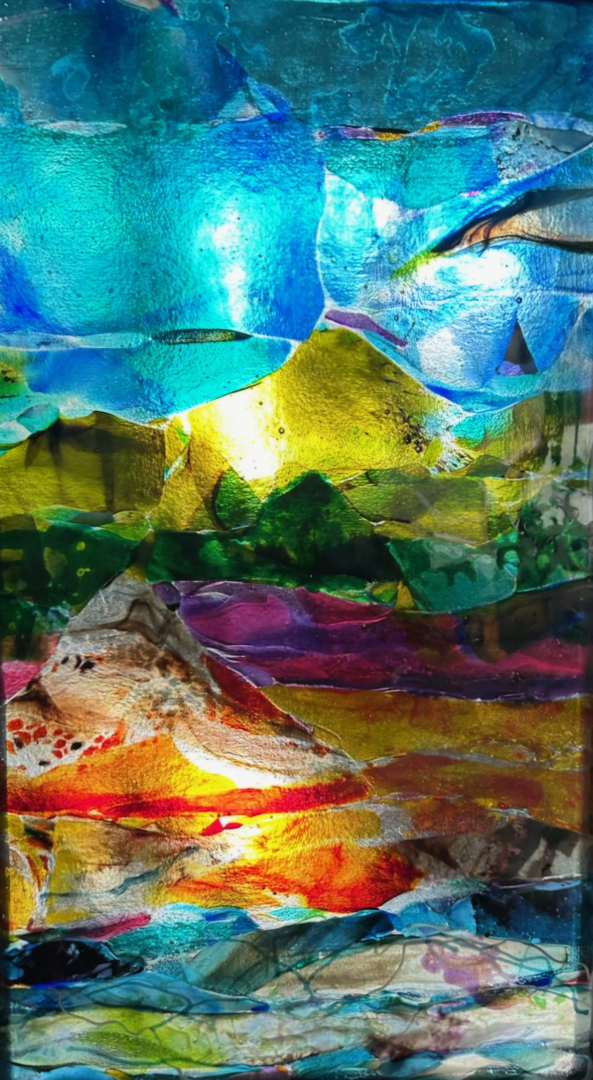 Abstract colorful painting with layers of blue, green, yellow, red, and purple paint, creating a textured and vibrant composition.