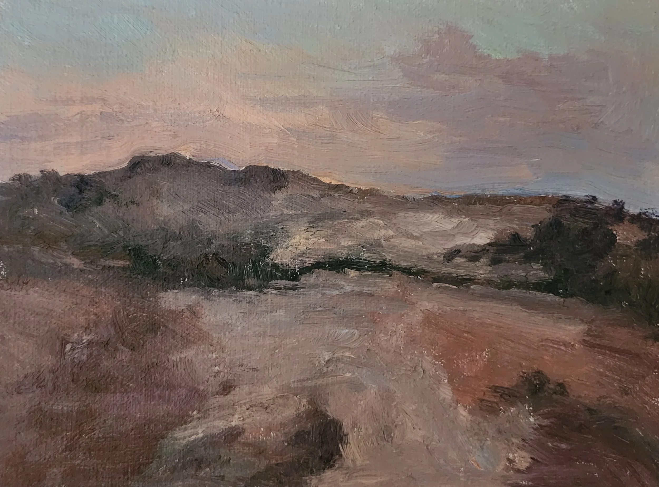 An impressionistic landscape painting of distant mountains, a pink and purple sky, and dark foreground terrain.