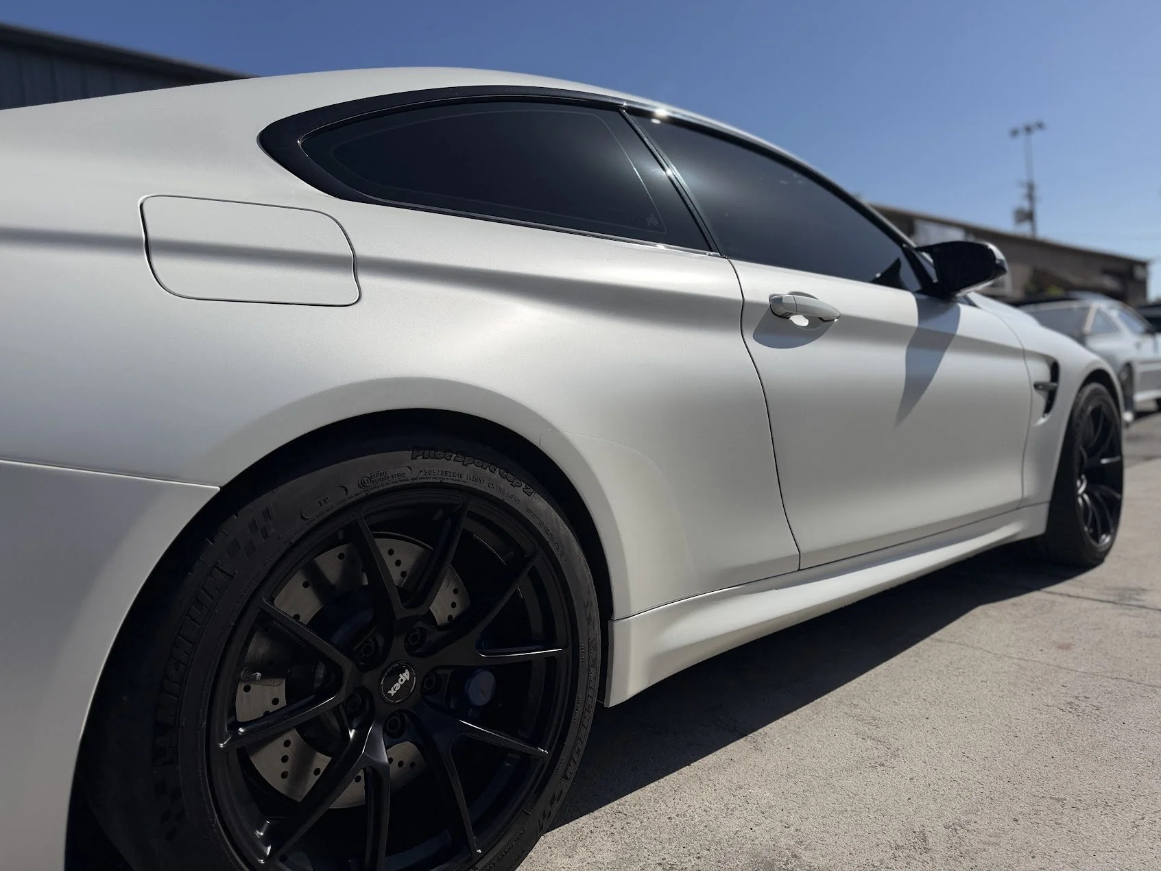 Damage repaired along with perfect Frozen matte finish pearl on this BMW M4