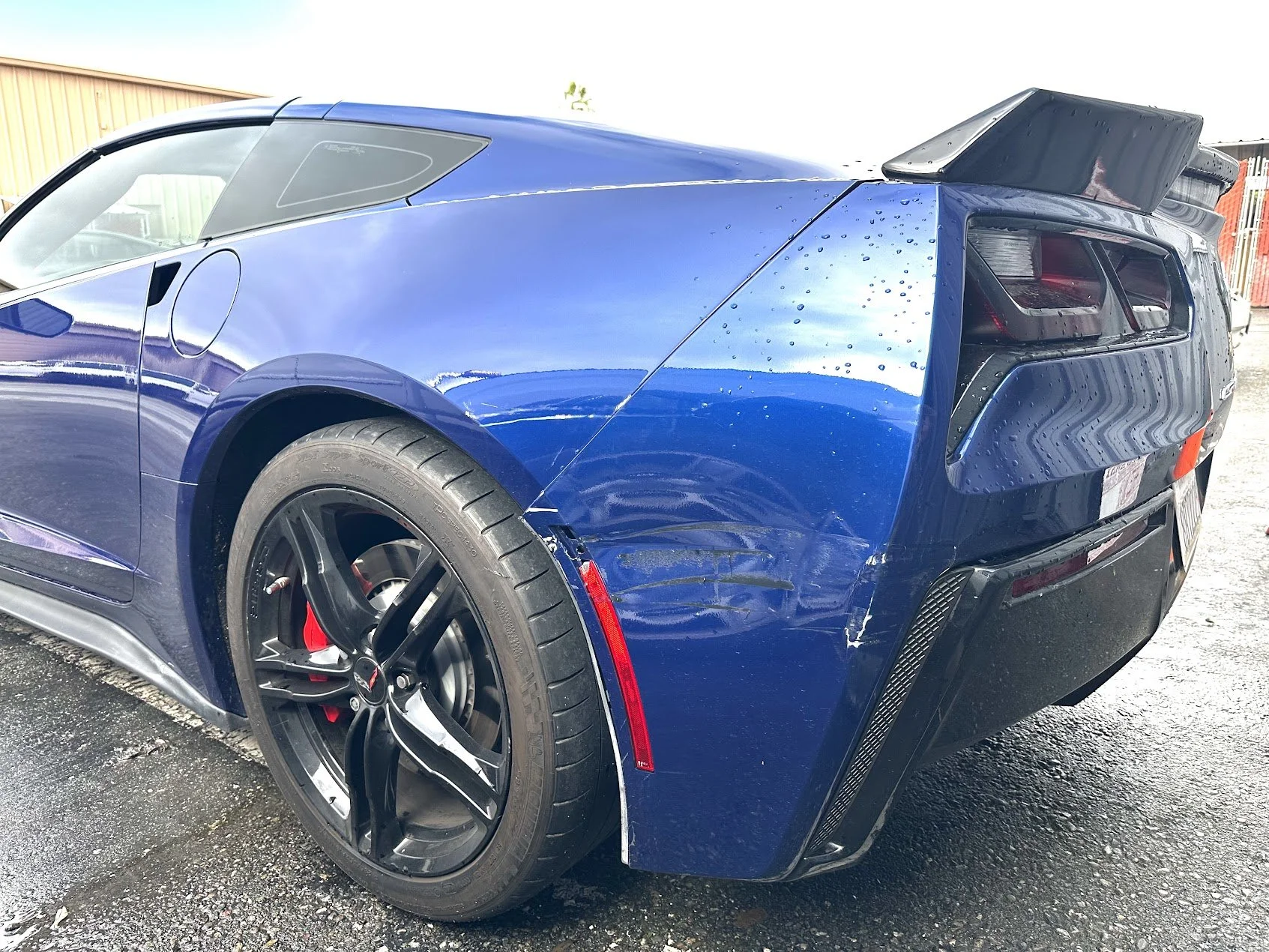 Bumper tear and fiberglass damage 