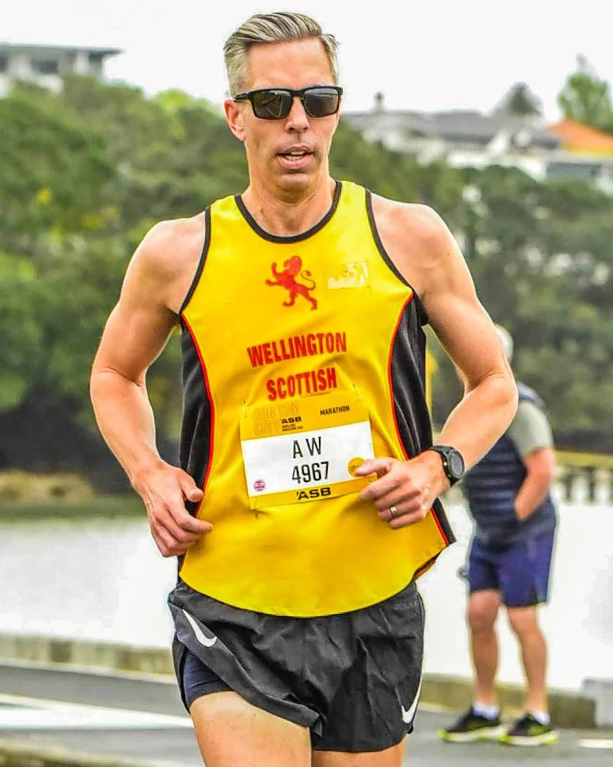 Andrew Wharton racing the 2019 Auckland Marathon in the Wellington Scottish singlet