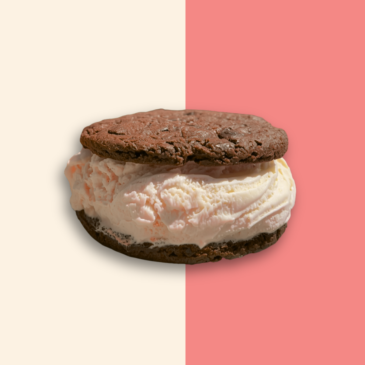 Ice cream sandwich with dark chocolate cookies and vanilla ice cream.