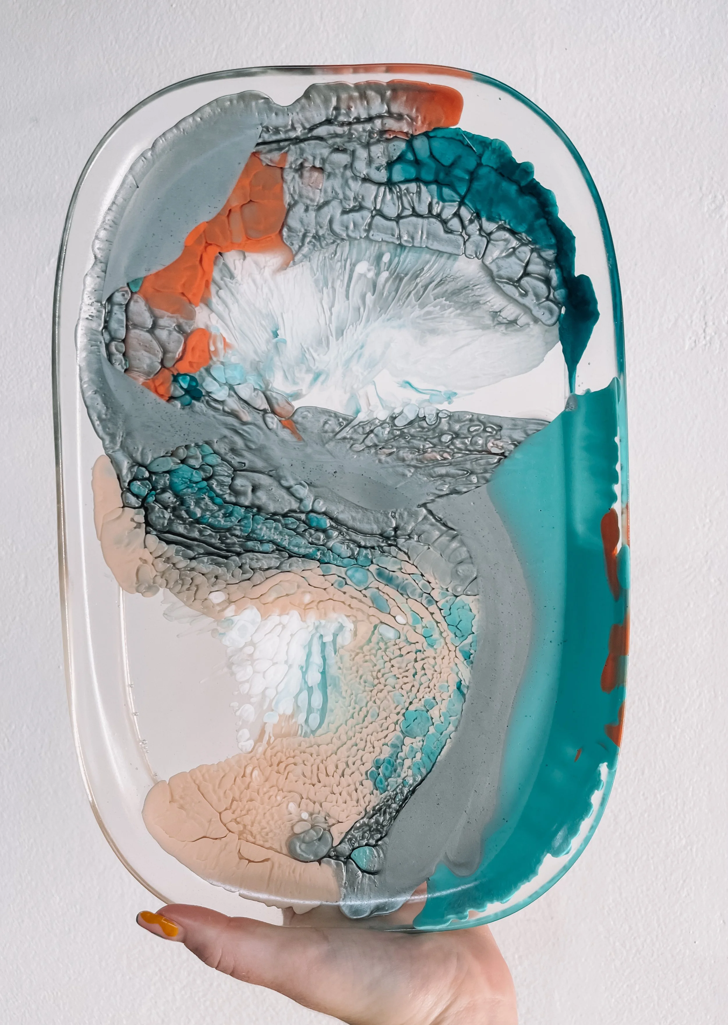 Serving tray created from moulded resin, clear base with blue orange and silver