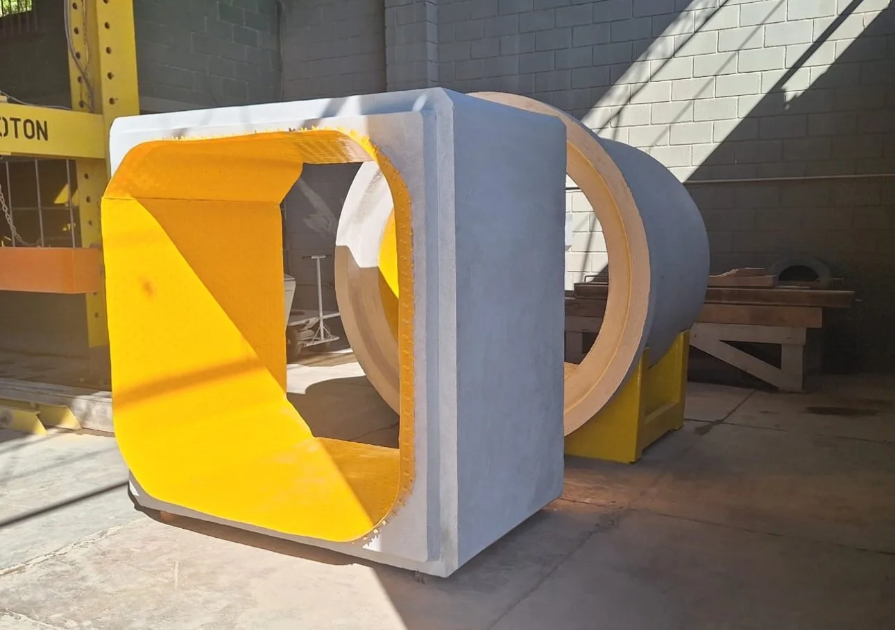 Precast box culvert and pipe section lined with yellow HDPE liner