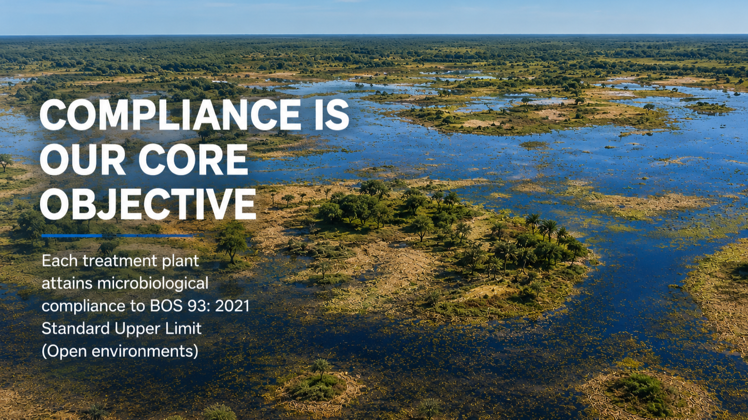 Aerial view of a wetland area with water, trees, and land patches, overlaid with white text that reads 'Compliance is our core objective' and a smaller paragraph about microbiological compliance to BOS 93: 2021 Standard Upper Limit in open environmen