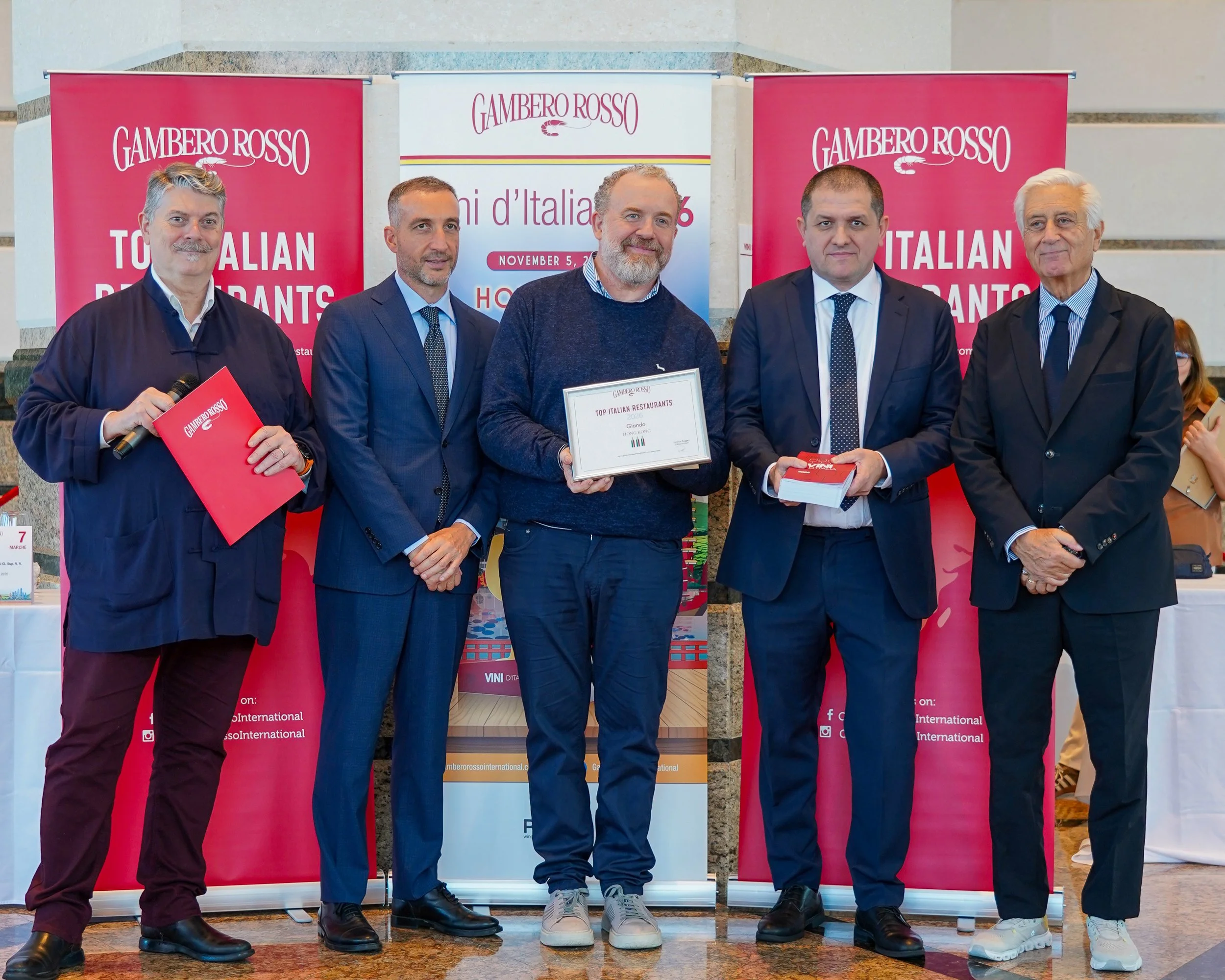 The Giando restaurant team receiving the prestigious Gambero Rosso award.