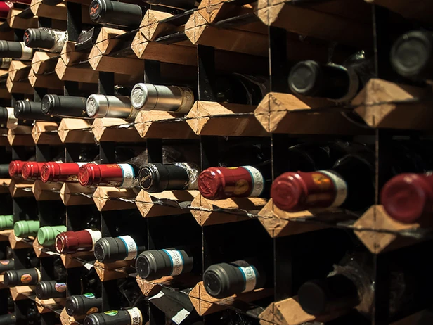 Premium Italian wine selection and wine cellar display at Giando.