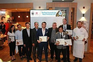 Chef Gianni Caprioli and the Giando restaurant team celebrating a culinary recognition award.