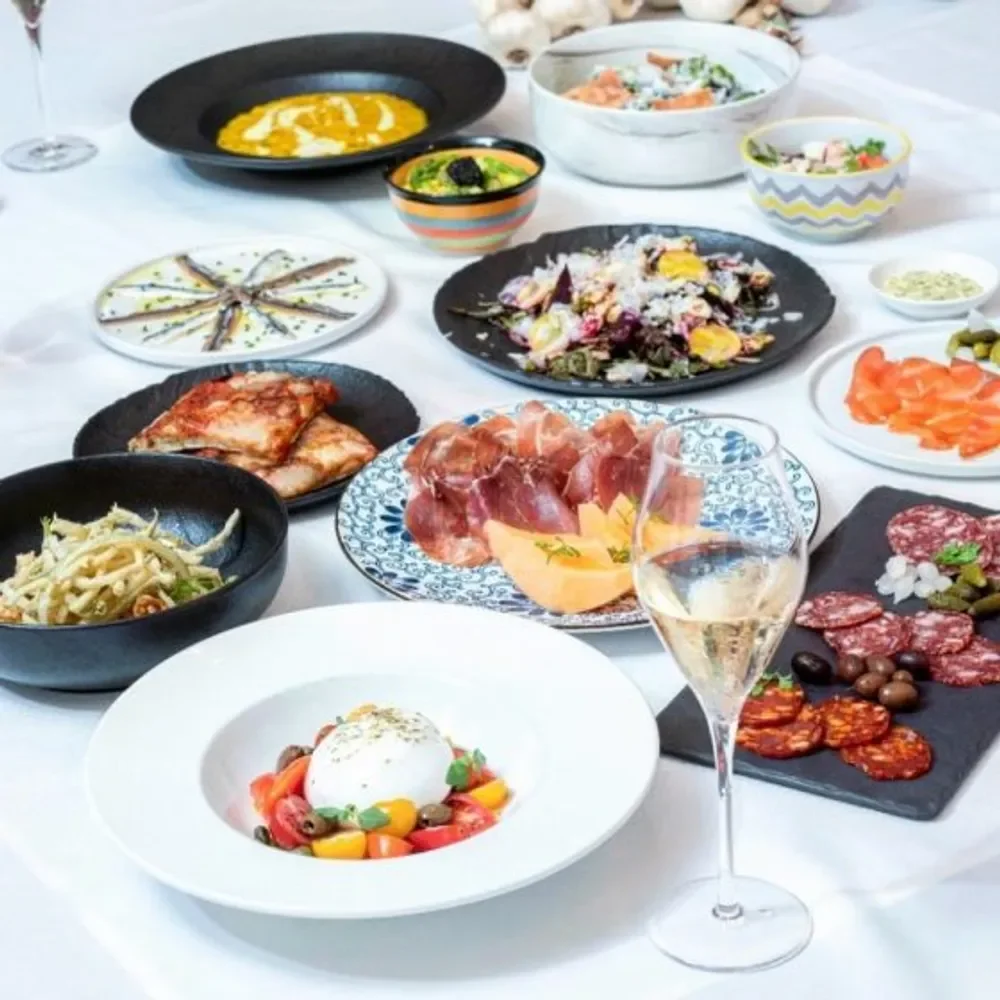 Authentic Italian feast featuring charcuterie, appetizers, and wine at Giando.