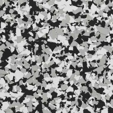 Close-up of a black, white, and gray speckled textured surface, similar to a terrazzo or granite pattern.