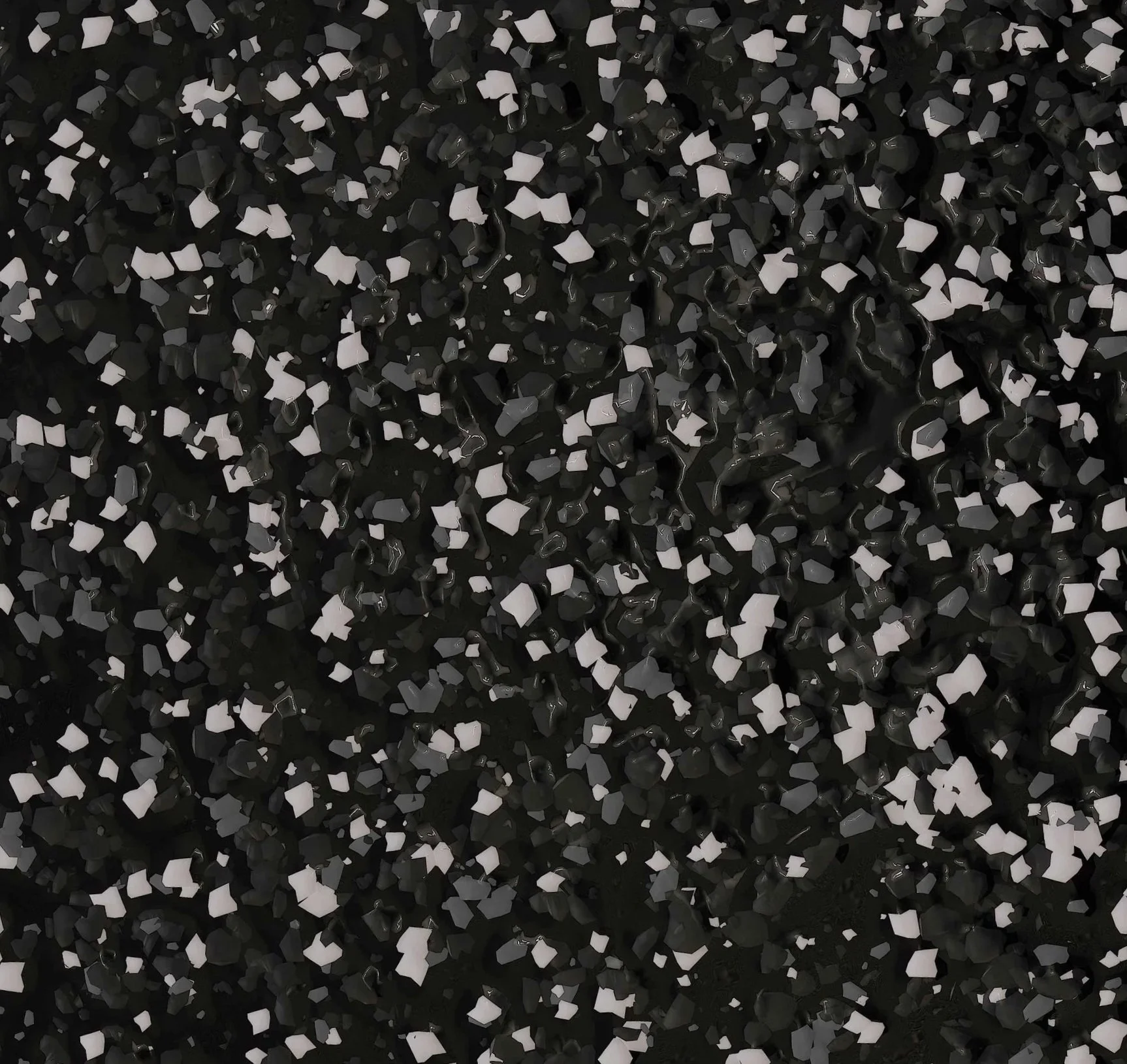 Close-up of a surface covered with small, irregular black and white hexagon-shaped beads or stones.