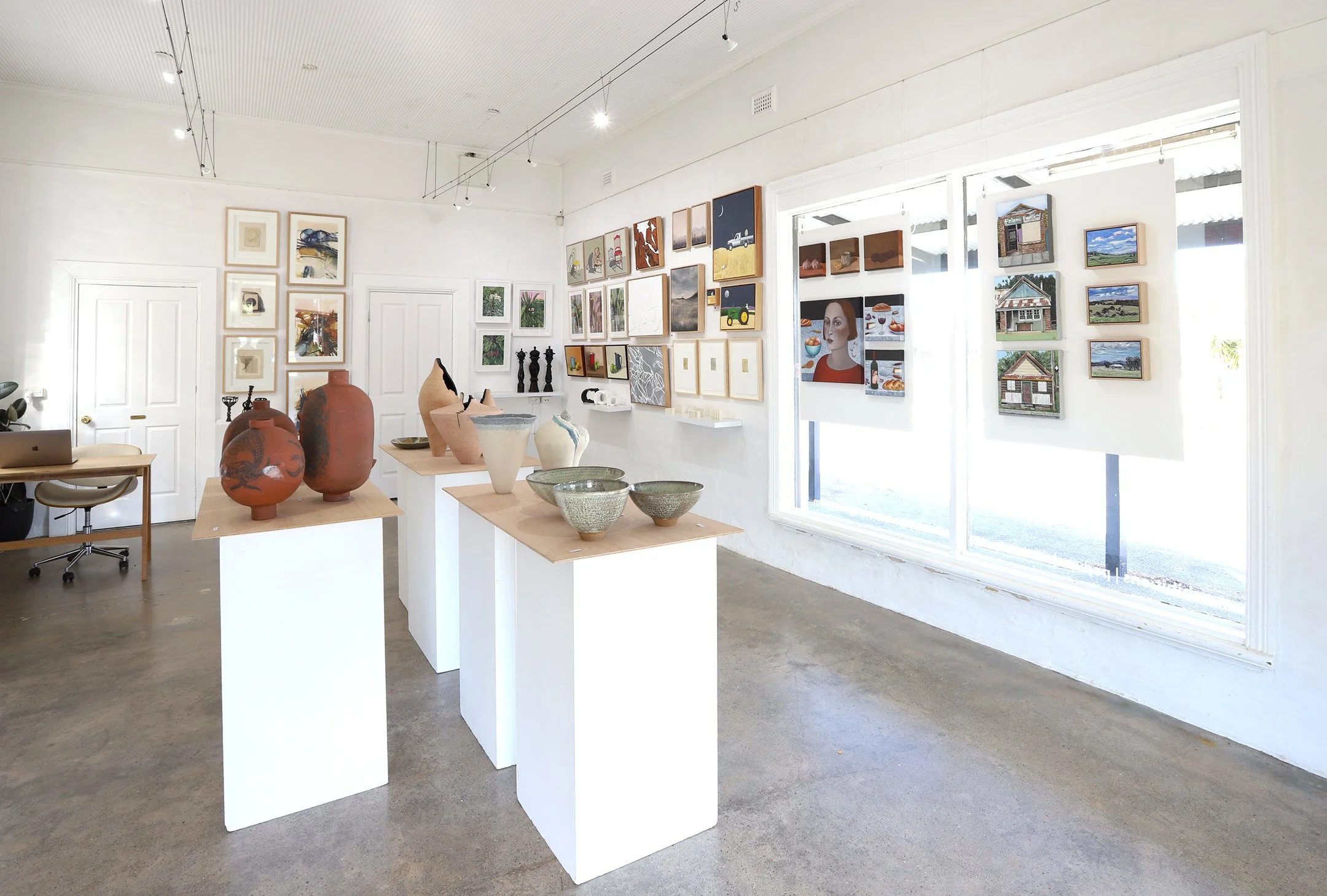 Photo of interior of Corner Story Gallery, Orange