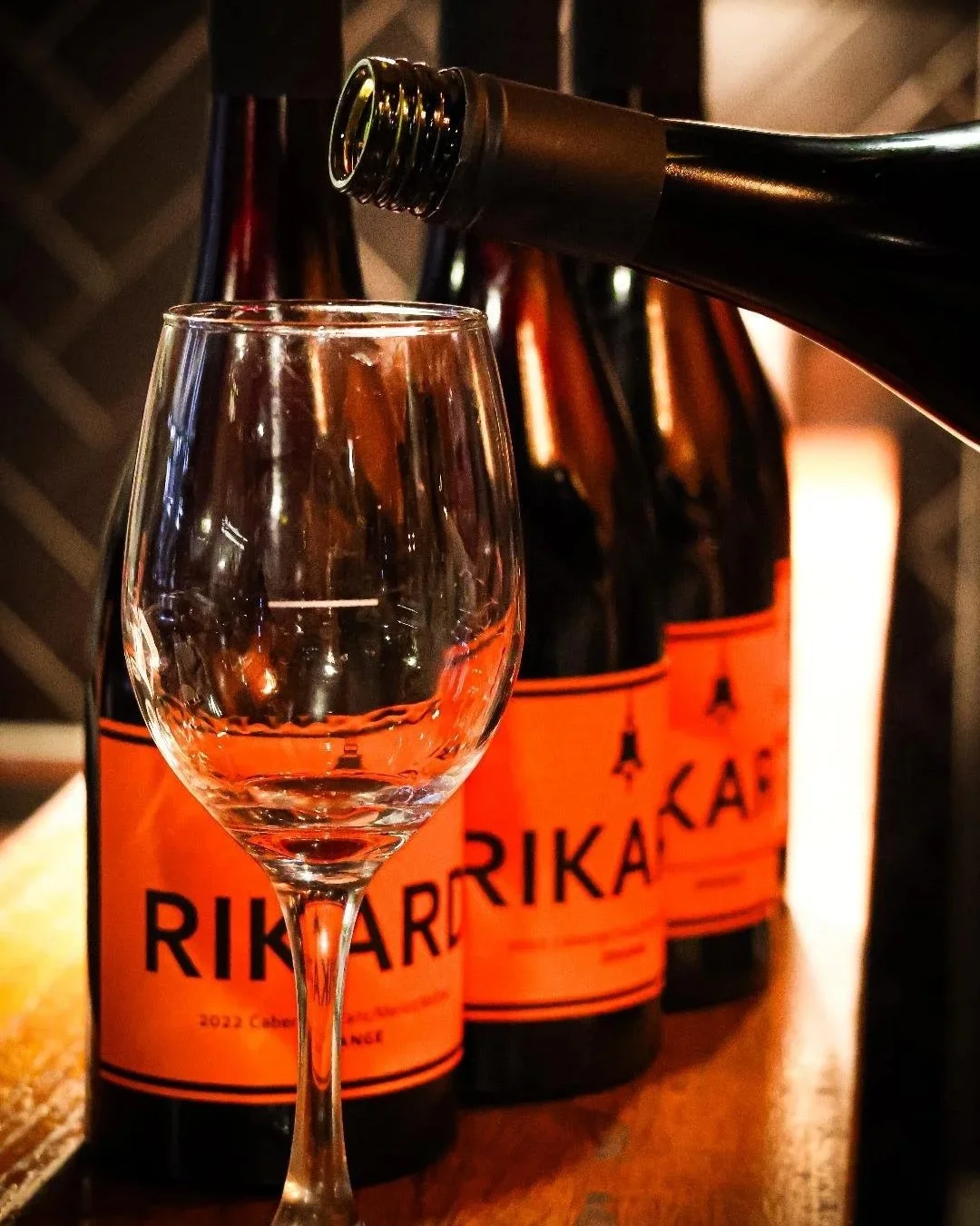 Wine being poured into a glass at Norma Joan, Bathurst