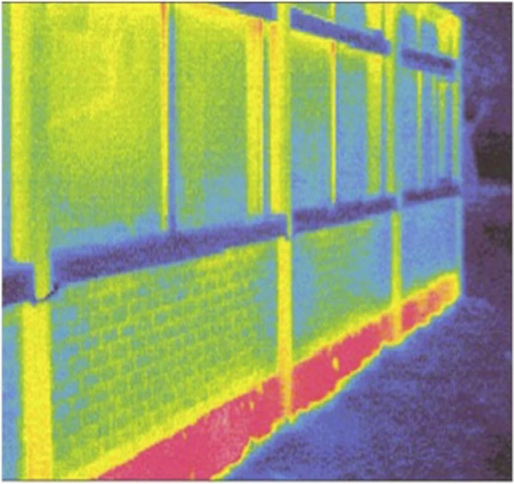 Infrared image of a stack of green crates or boxes on a warehouse floor.