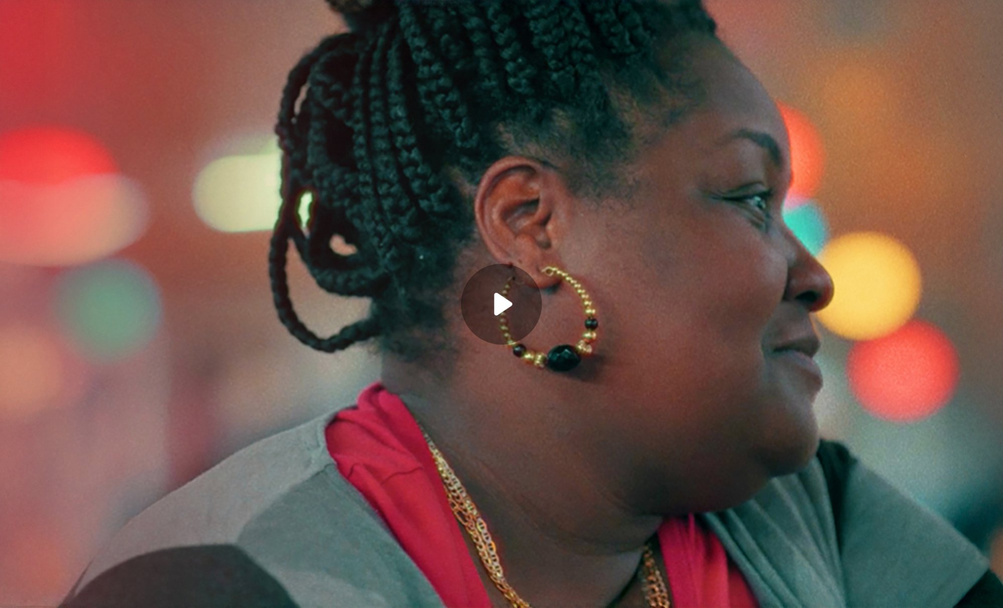 Kersten, a single mother from Charlotte, looking into the camera in a scene from the short film Never Done.