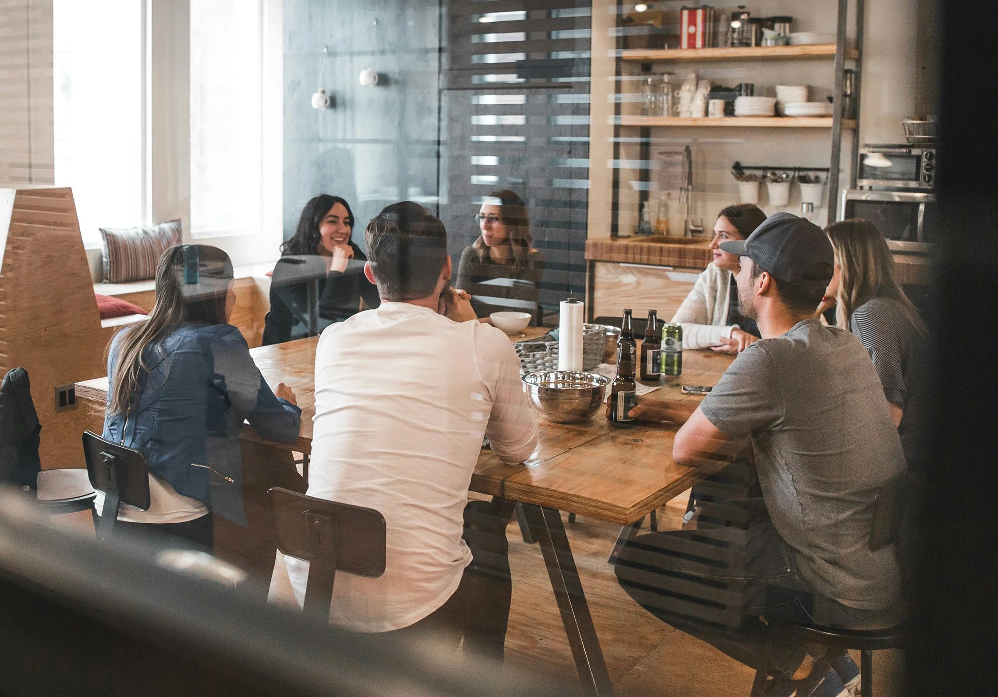 Diverse team meeting in a collaborative workspace discussing skills, careers, and professional development