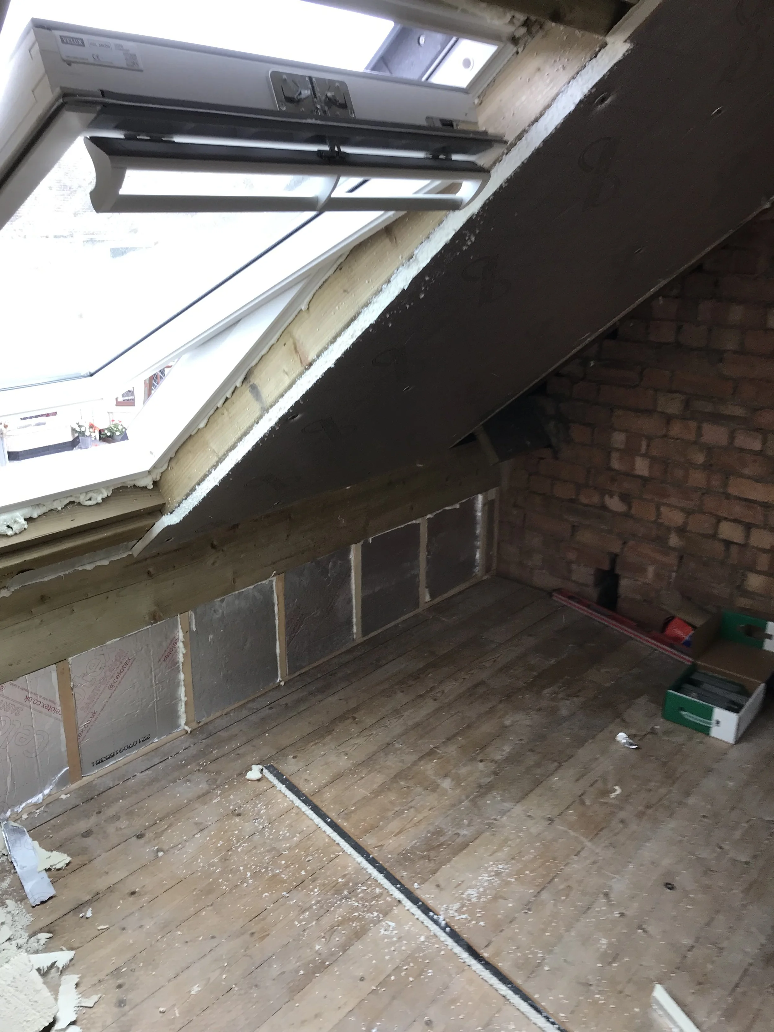 Roof structure and insulation installation during warm deck flat roof build on a West Midlands property — Radian Roofing