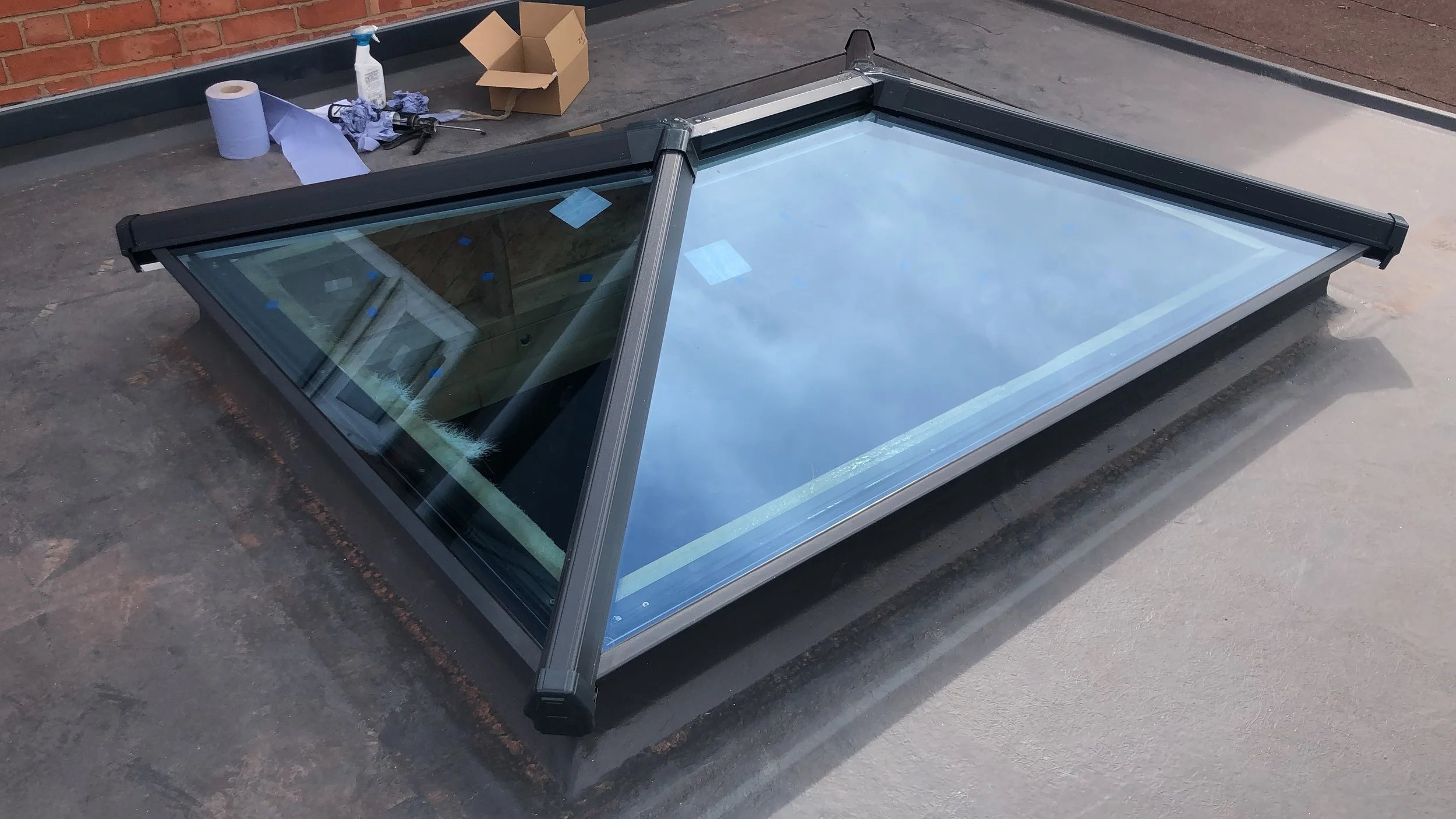 GRP flat roof with roof lantern installation in progress on a residential extension — Radian Roofing, Solihull and Birmingham