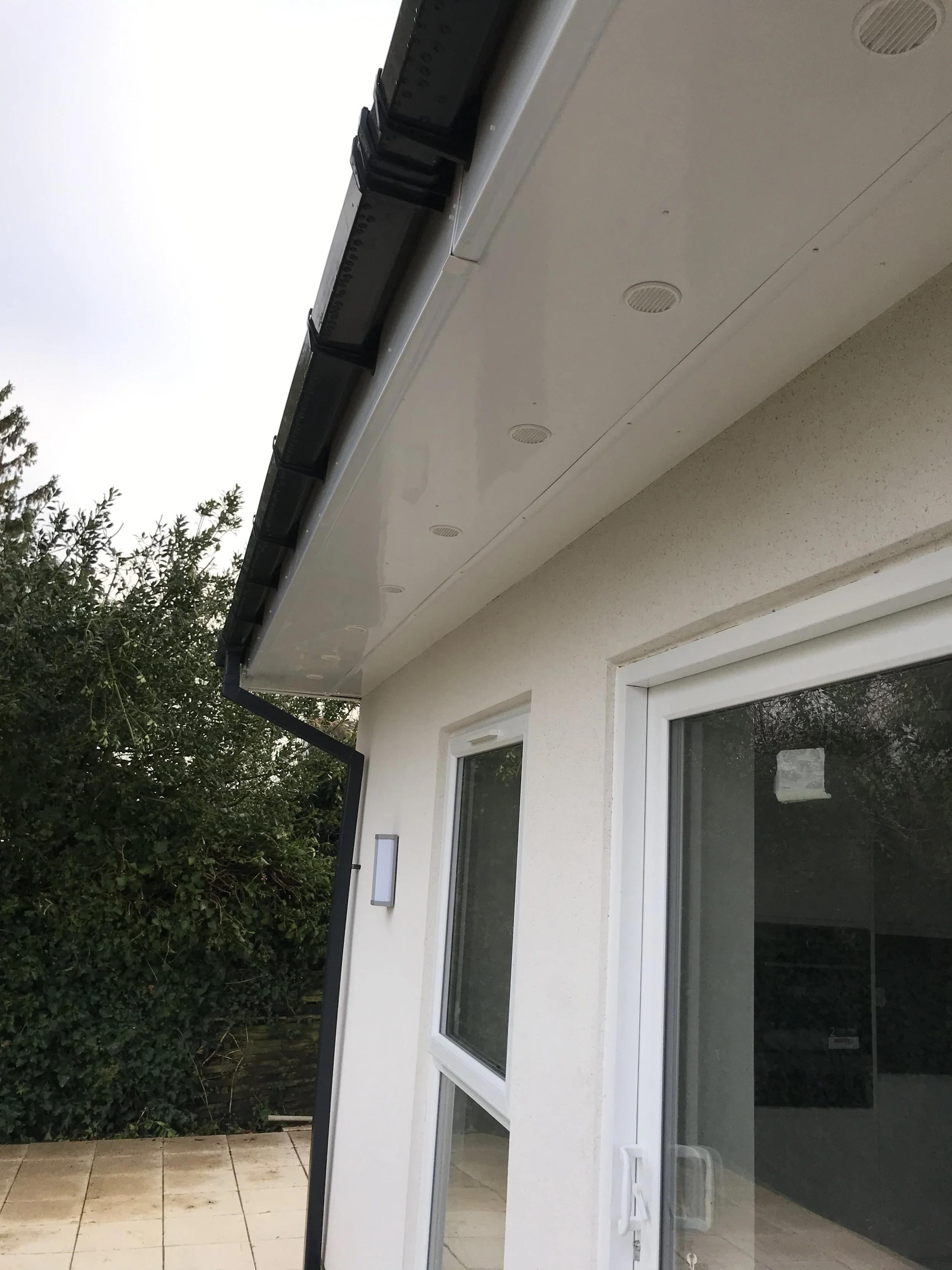New black guttering and fascias installed on a residential property in Solihull — Radian Roofing roofline specialists