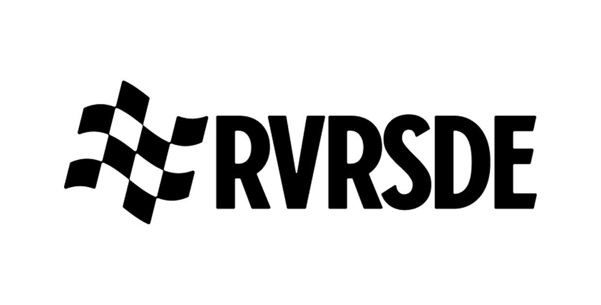 Black and white logo with a checkered flag next to the word 'RVRSDE' in bold, uppercase letters.