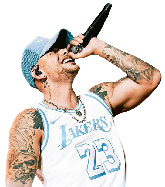 Male performer singing into a microphone, wearing a blue Lakers basketball jersey and a blue cap.