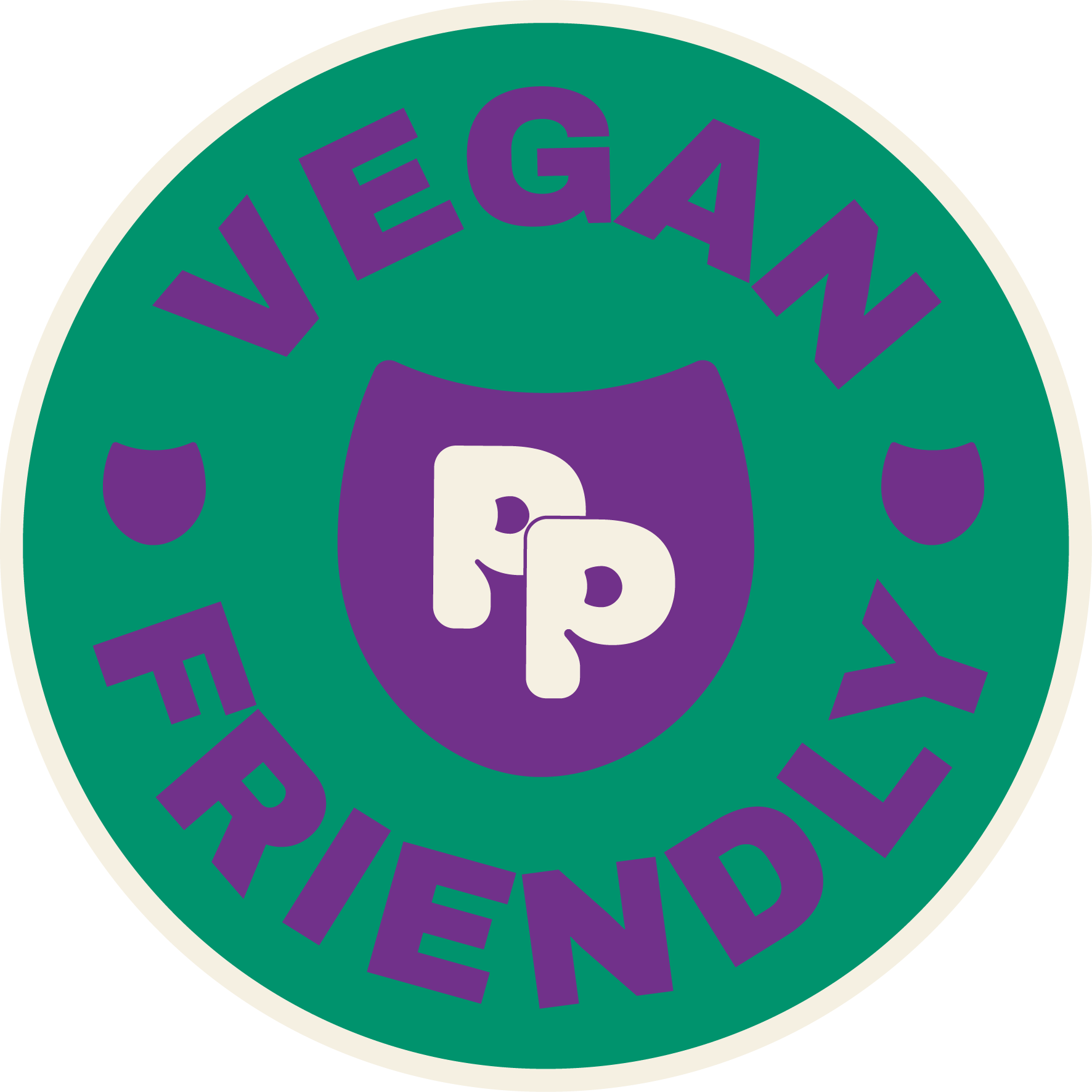 A circular green badge with purple text that says 'VEGAN' and a white and purple smiling mouth in the center
