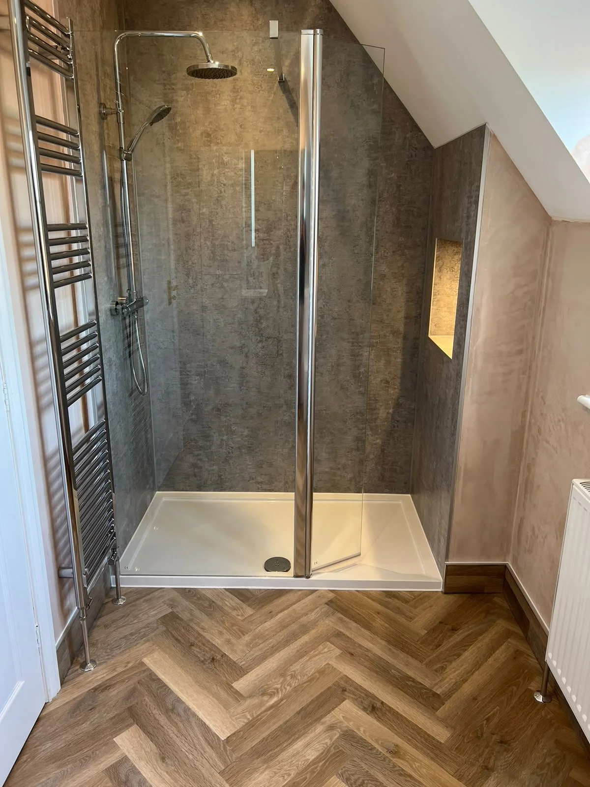 Modern, stylish and gives that wow factor! New Bathroom instillation completed by Holland & Holland Services. 