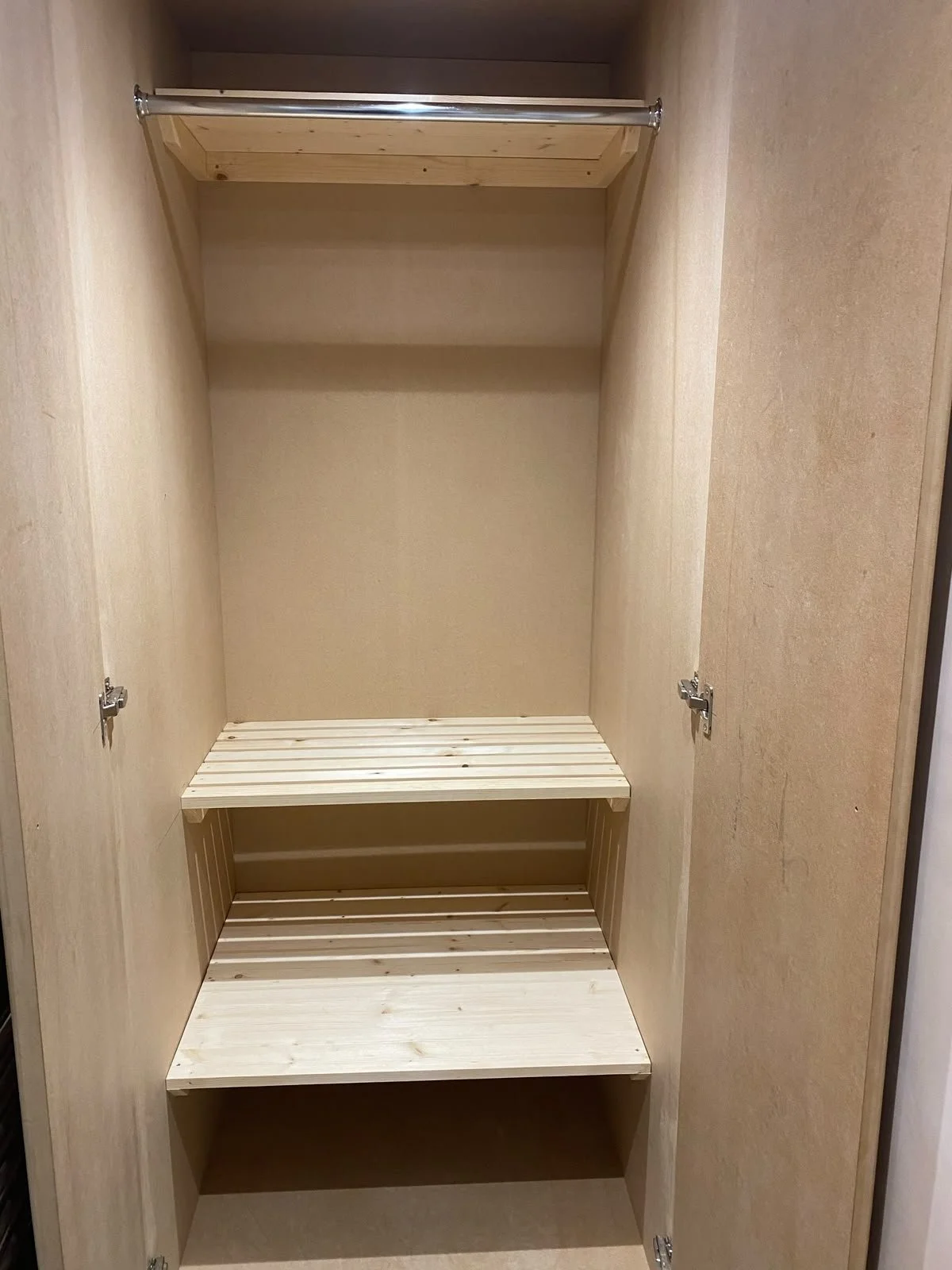 Bespoke storage cupboard with plenty of space designed, created and installed by Holland & Holland Services