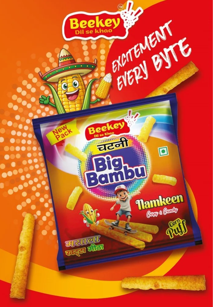 Colorful advertisement for Beekey Big Bambu Namkeen, a savory snack, featuring a cartoon corn character and a child skateboarding, with puffed corn snacks scattered around.