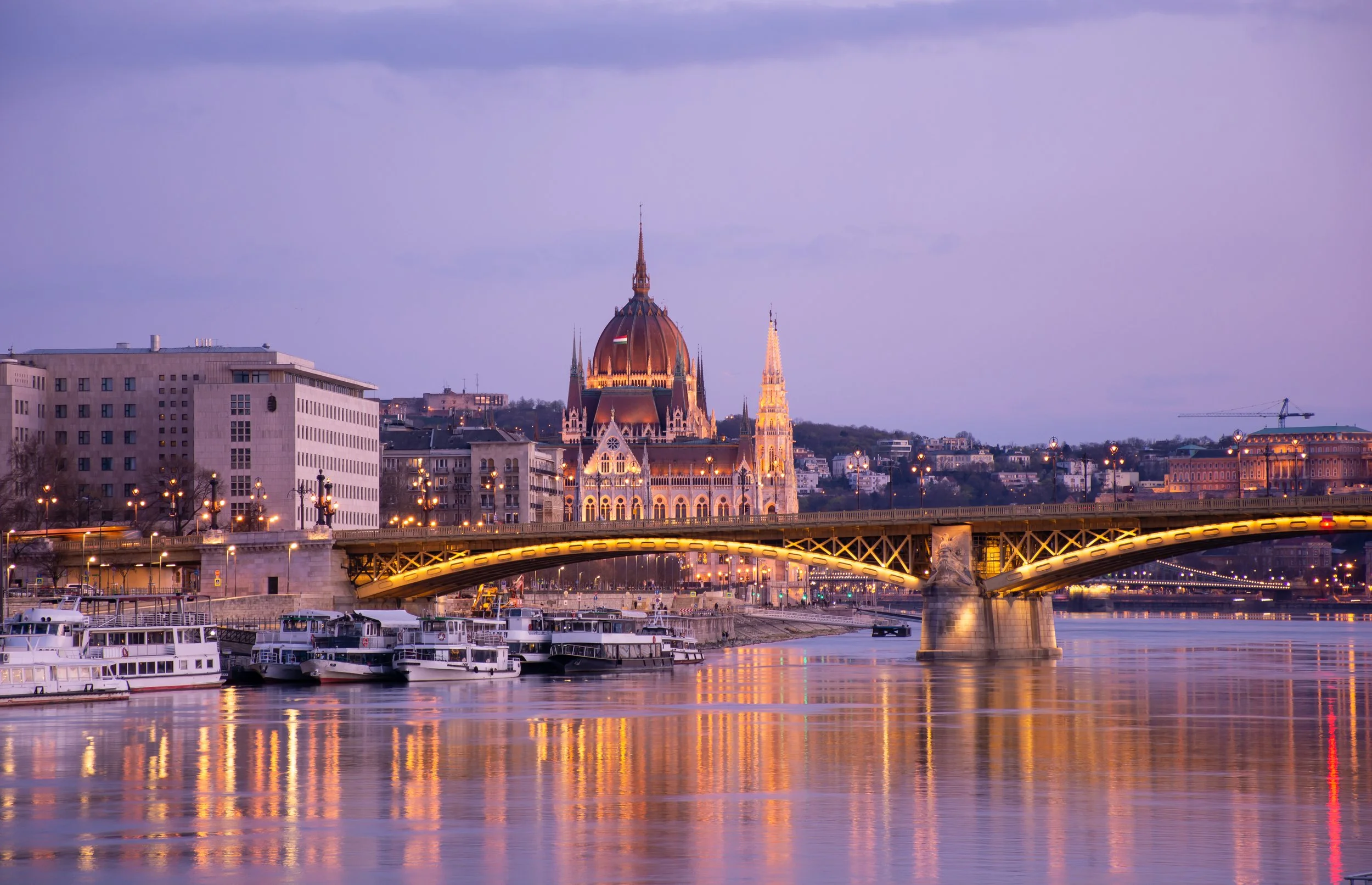 evening-budapest-parliament-against-background-margaret-bridge-reflection-lights-water.jpg