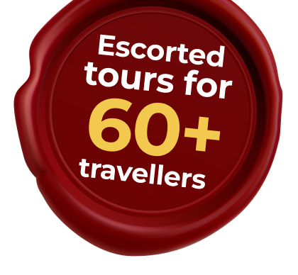 Red circular badge with white and yellow text that reads 'Escorted tours for 60+ travellers'.