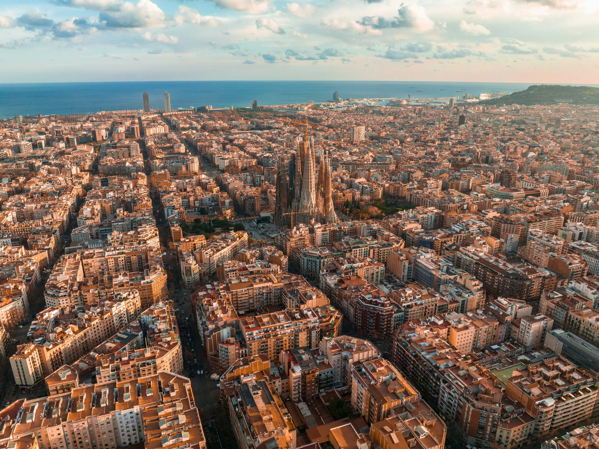 aerial-view-barcelona-city-skyline-sagrada-familia-cathedral-sunset.jpg