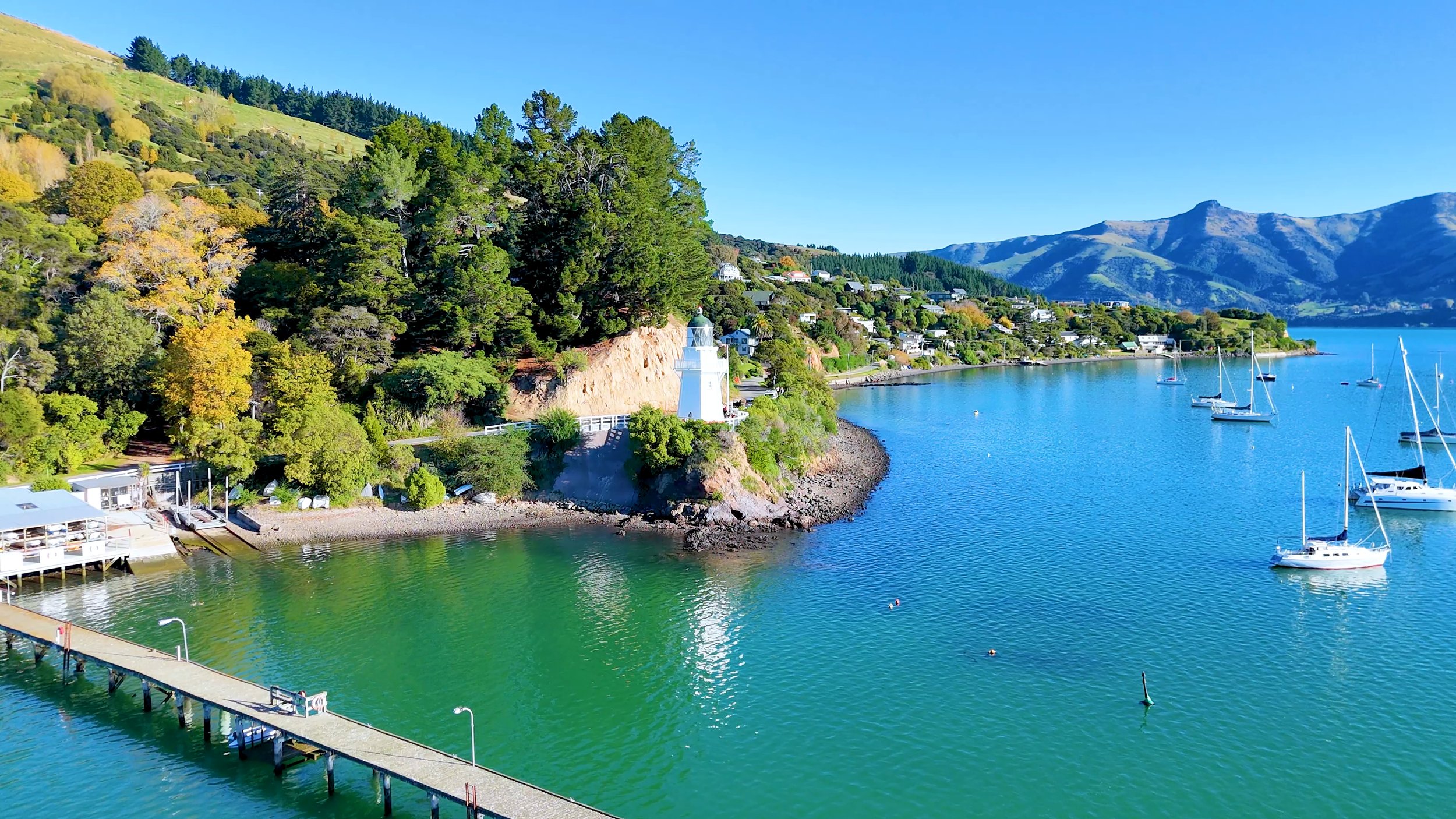 aerial-view-akaroa-lighthouse-bay-with-sailboats.jpg