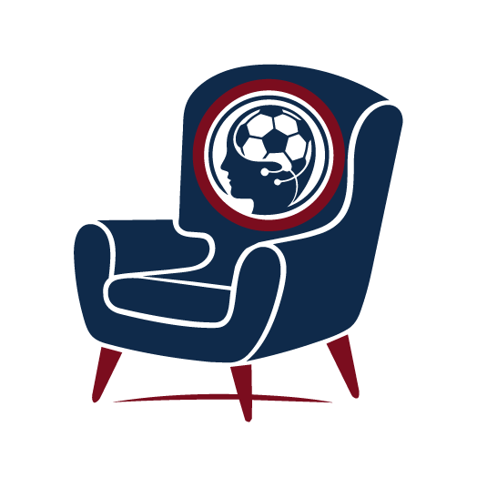 A comfortable armchair with a human head profile inside a circle, connected to a soccer ball, symbolizing sports or gaming.