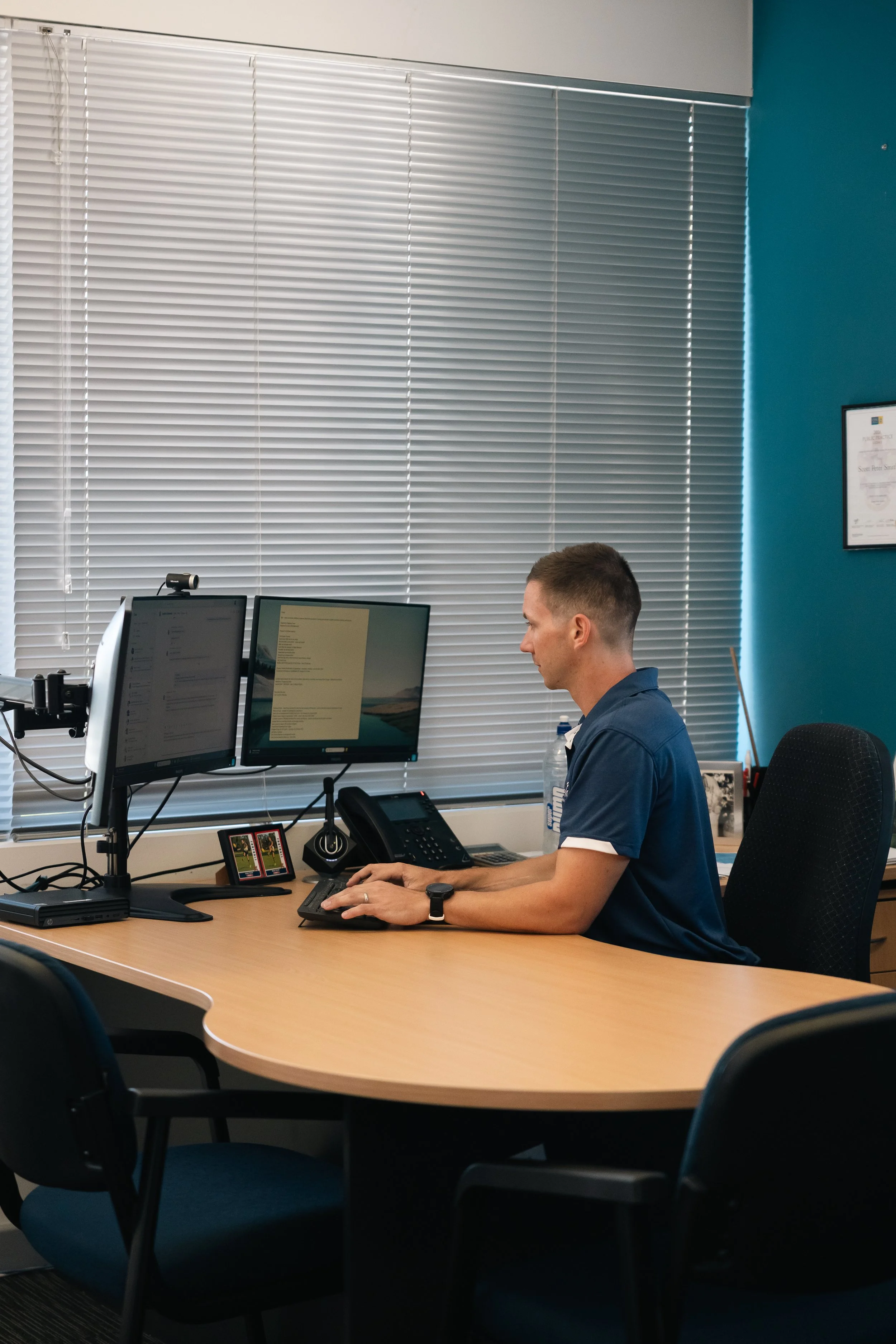 Byfields adviser working at a computer in the office