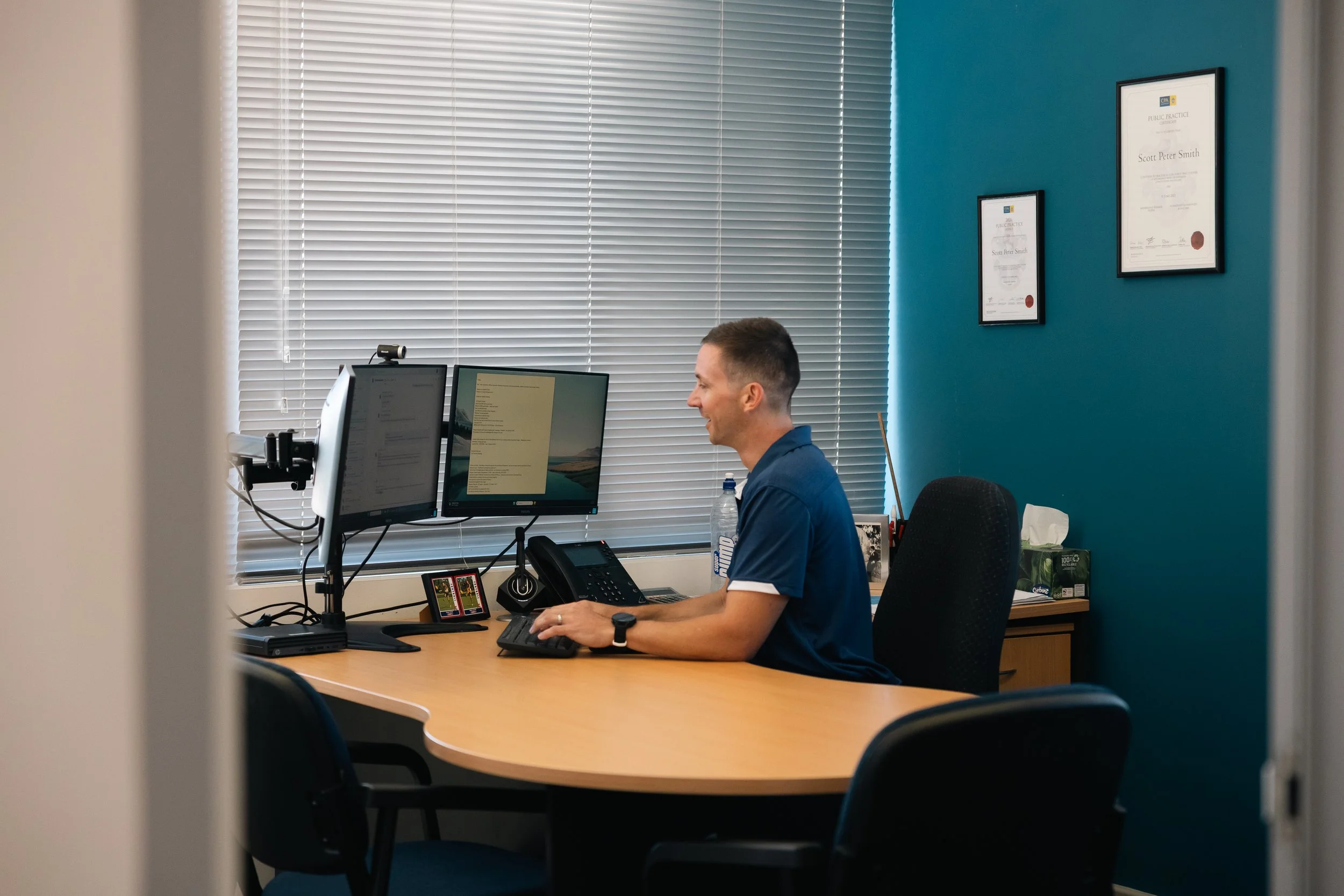 Byfields adviser working at a computer in the office