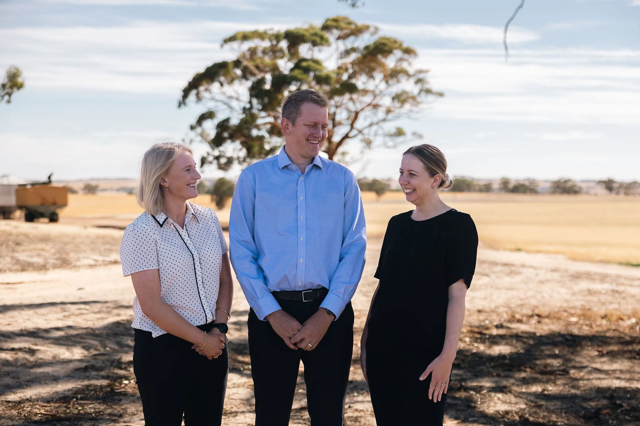 Three Byfields advisers standing together in a paddock