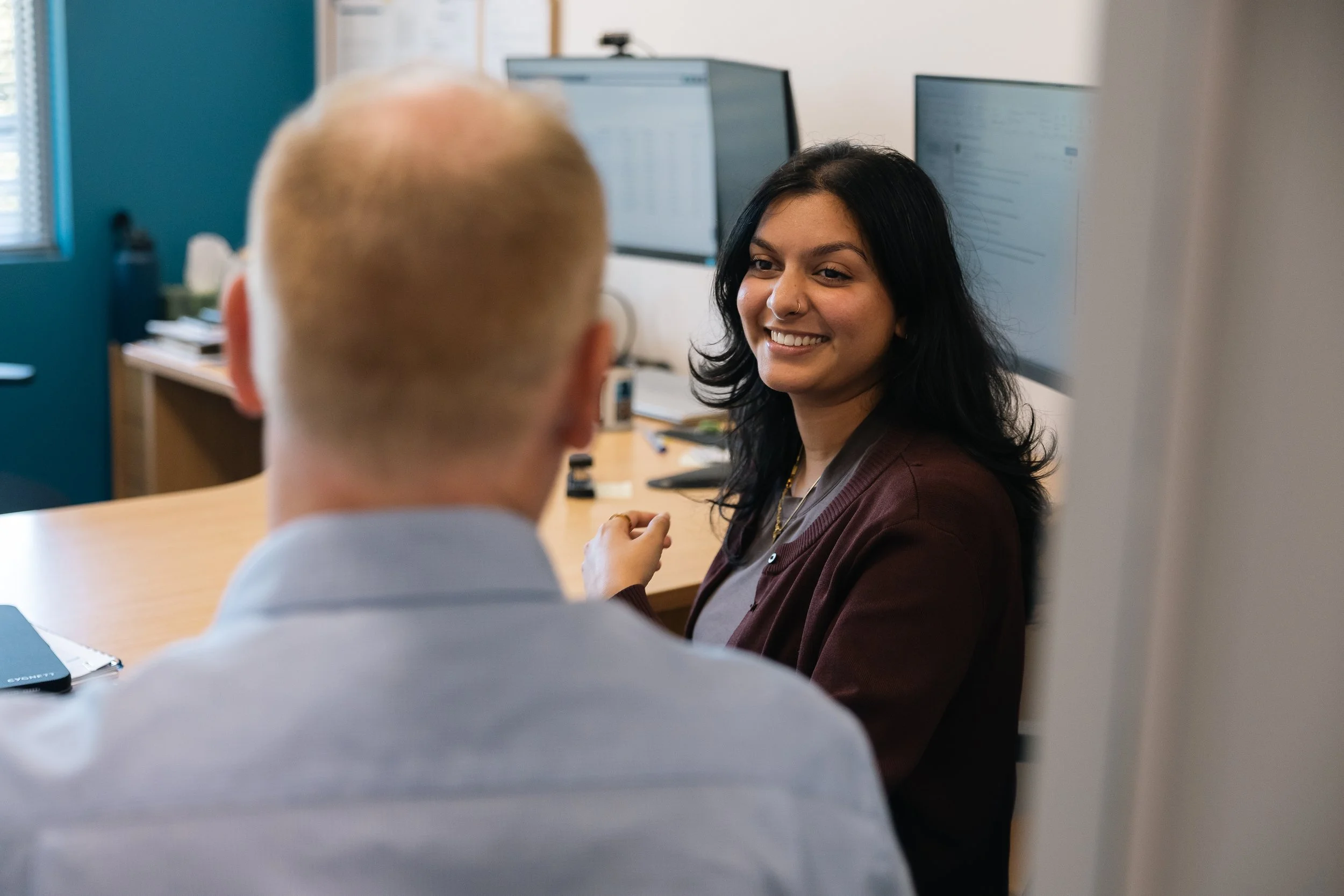 Byfields adviser in a meeting with a client