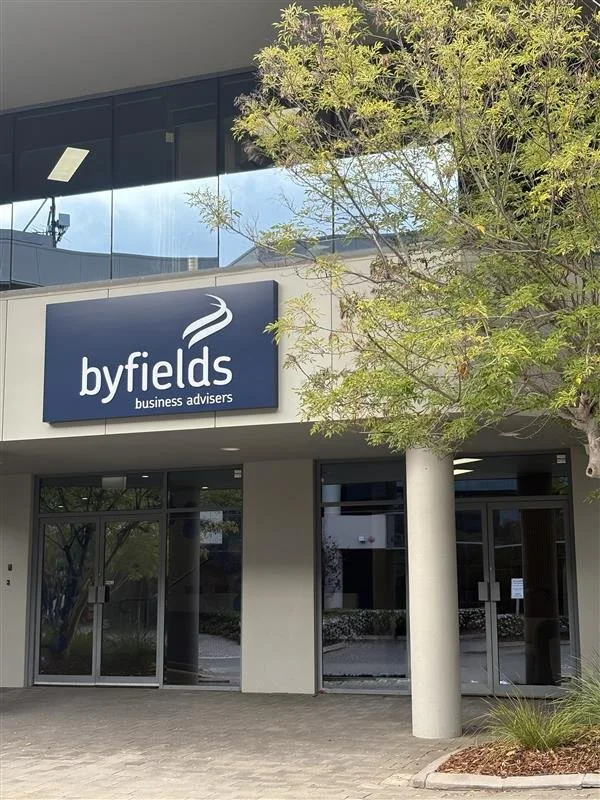 Exterior of a Byfields office with signage