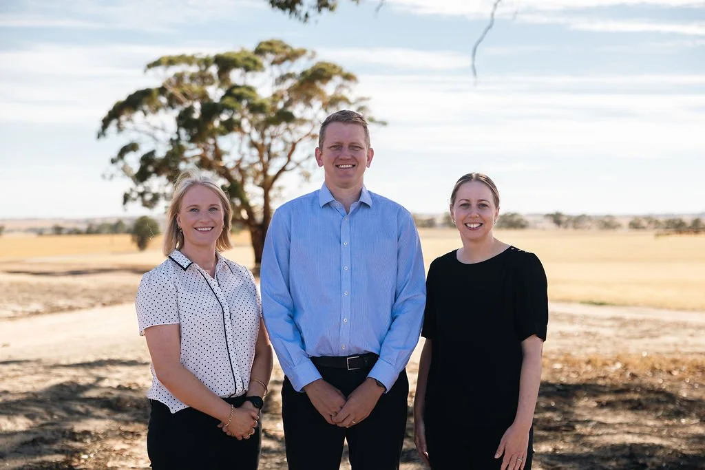 Three Byfields advisers standing in a paddock