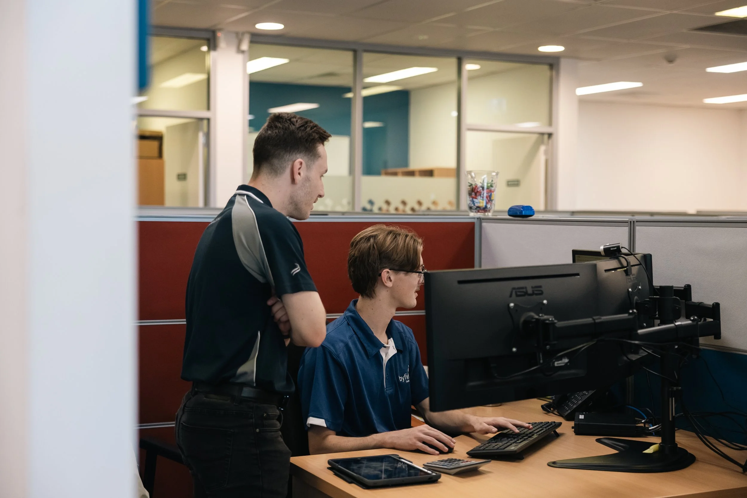 Byfields advisers working together at a computer
