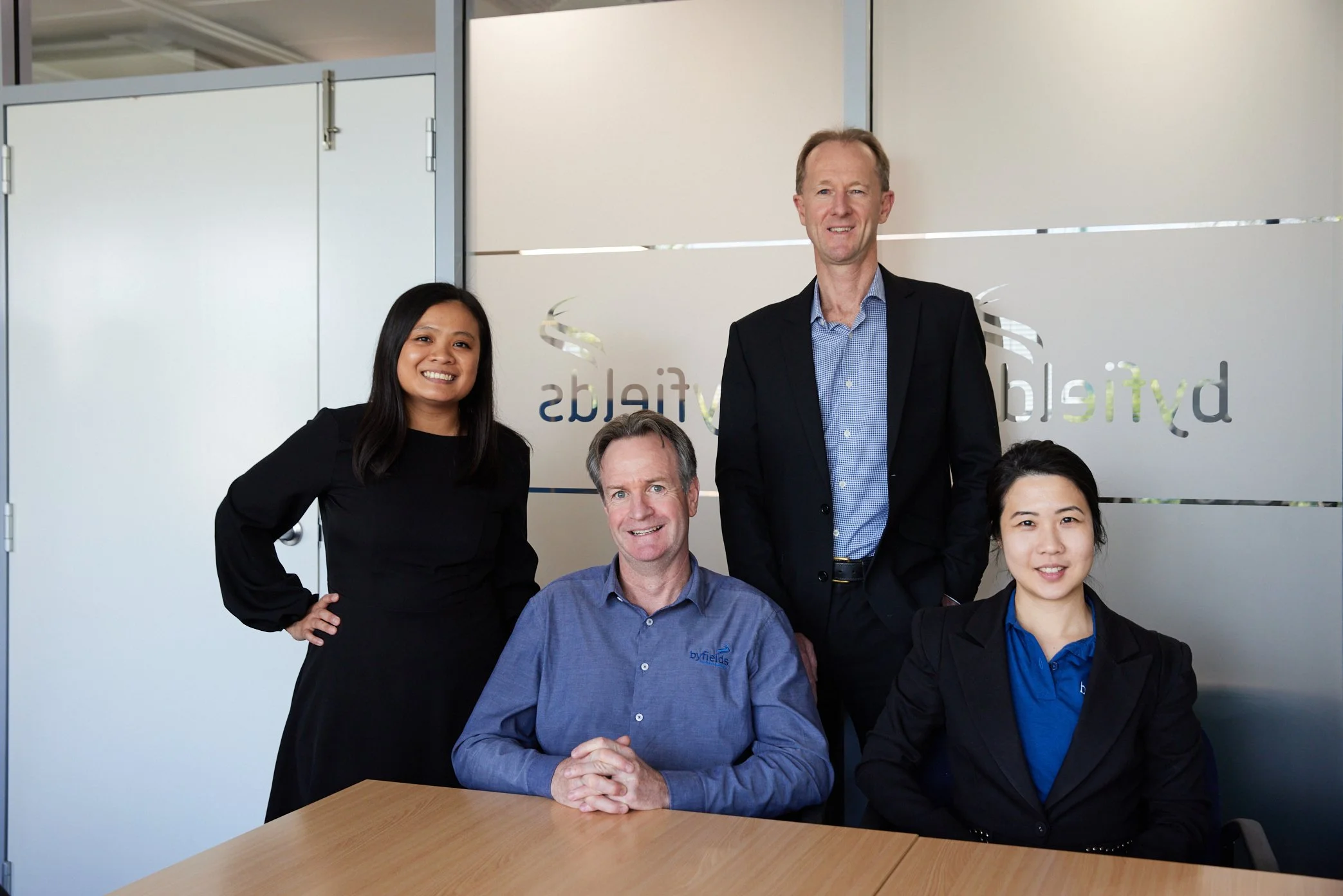 Four Byfields business managers in the office