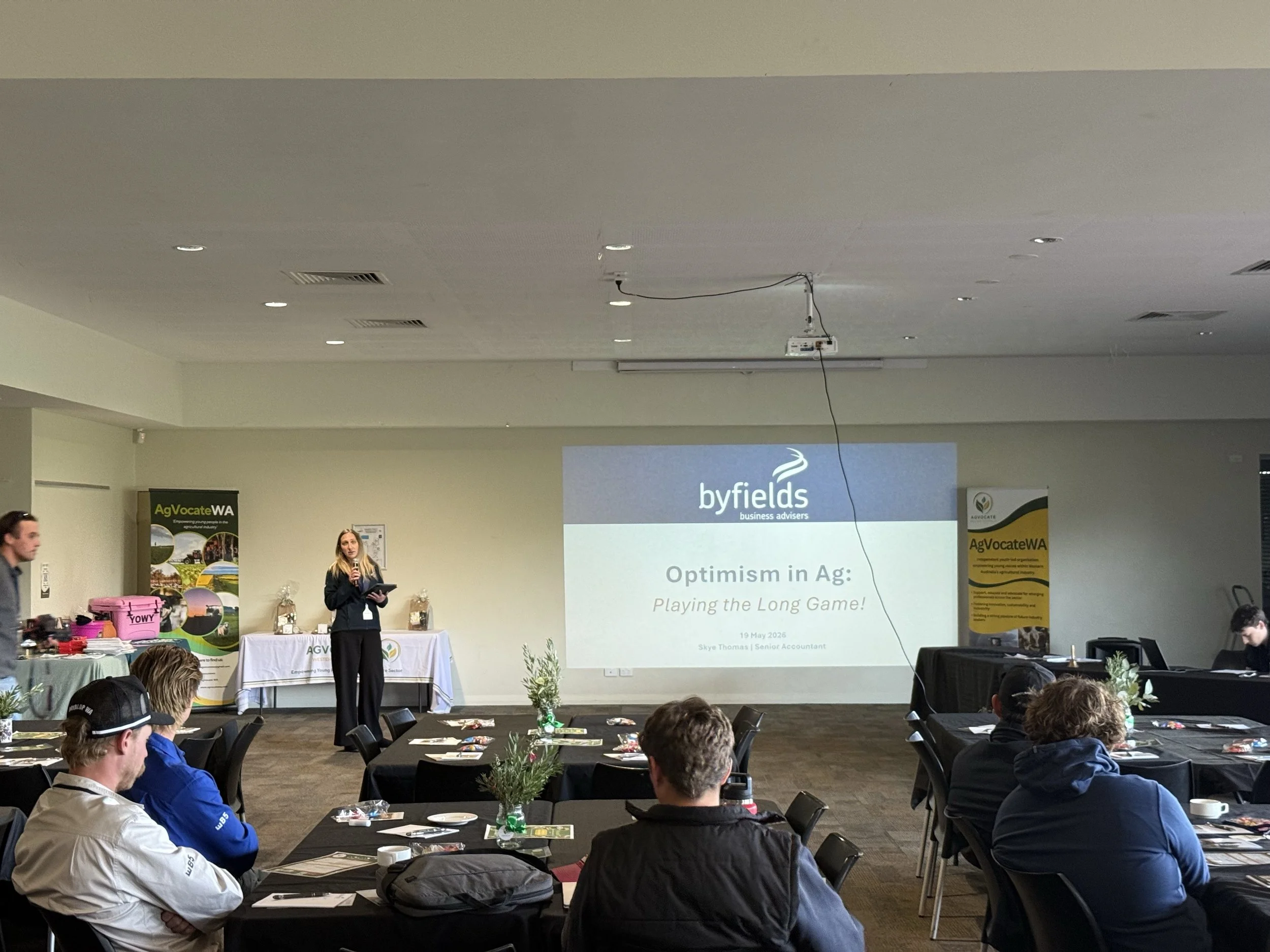 Audience watching a presentation at a Byfields seminar