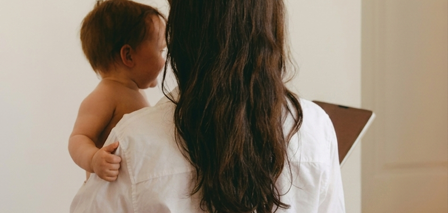 mother holding child