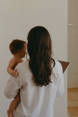 mother holding child