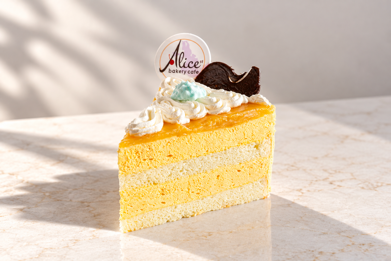 Elegant Mango Mousse Cake Slice.png (Copy)