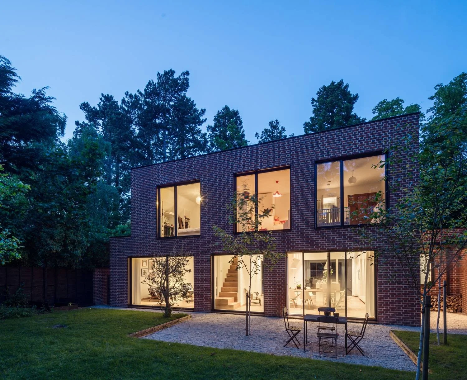 Award-winning contemporary replacement dwelling in Newbury, Berkshire, combining Arts and Crafts influences, Flemish bond brickwork and high-quality modern family living - Edge Architecture