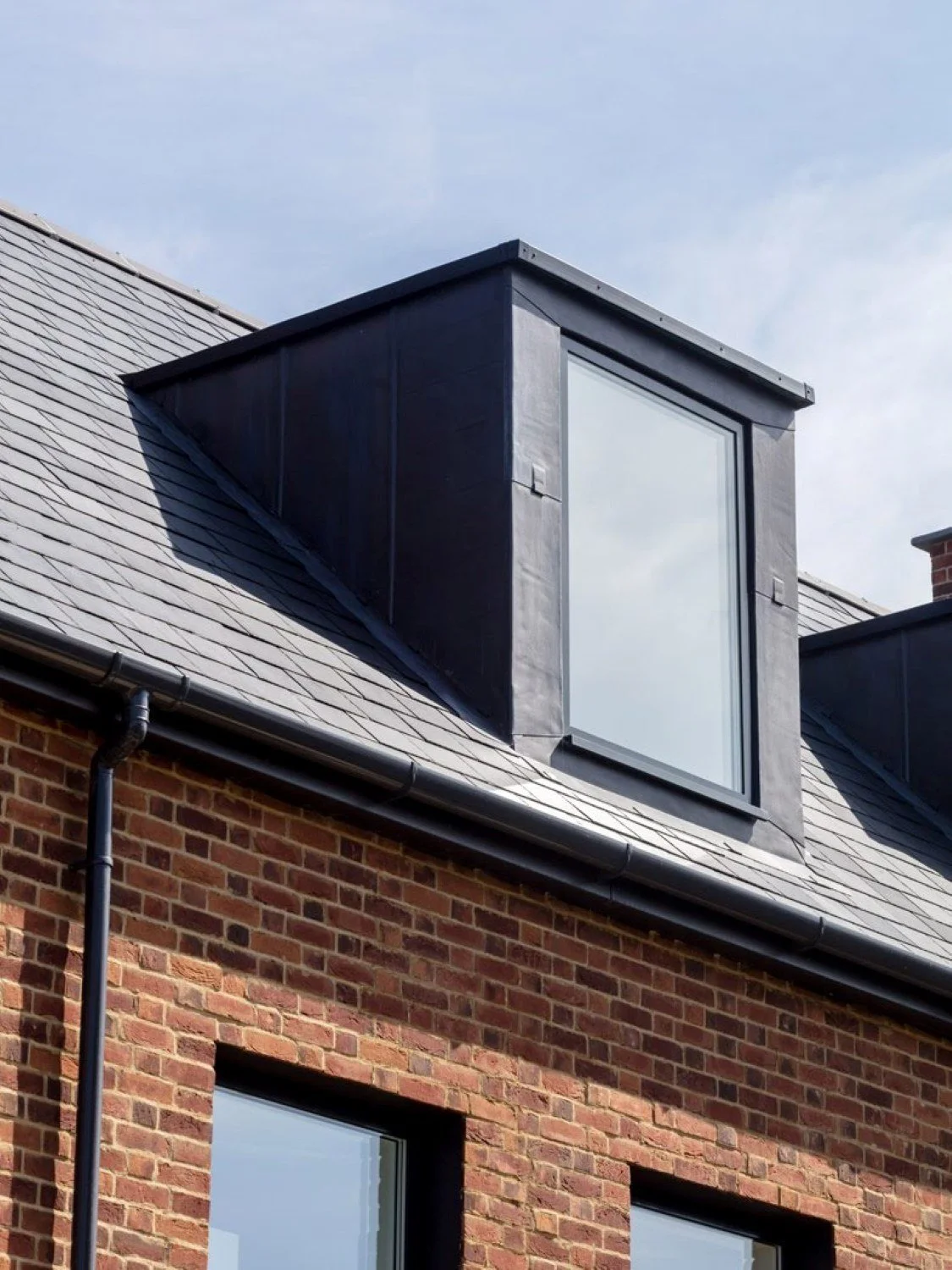 Infill development in Hungerford, Berkshire, delivering three townhouses and ten apartments within a conservation area, combining contemporary architecture with a sensitive historic setting - Edge Architecture